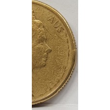 AUSTRALIA . UNDATED . ONE 1 DOLLAR COIN . ERROR . OIL FILLED ON OBVERSE . MISSING LEGEND